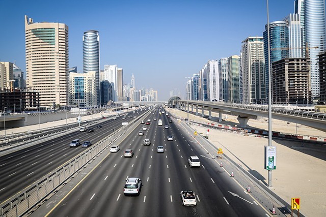 You can find the Burj Khalifa and Dubai Mall on a famous road in UAE. This road leads to the capital city. Name the road.