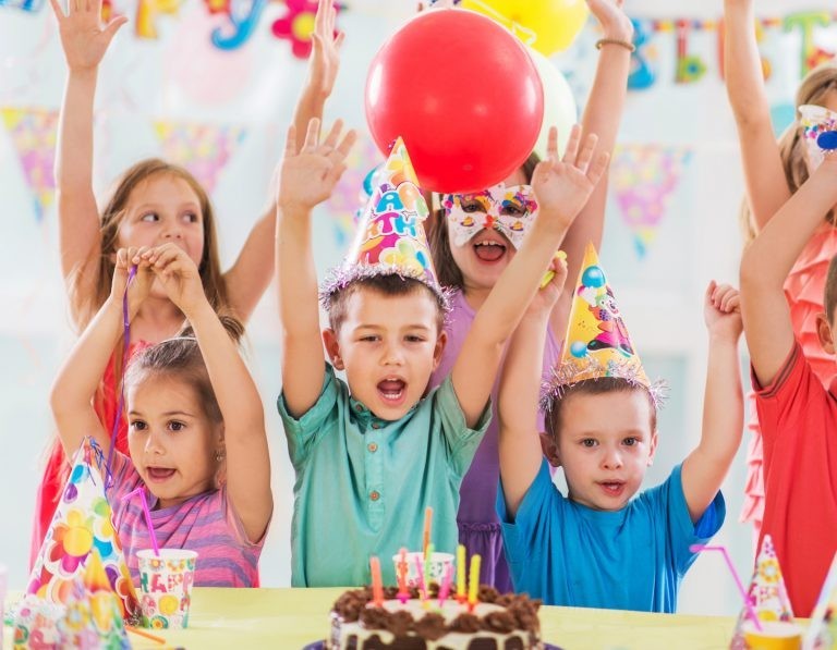 This is Sallys kid. His birthday is coming up and he still wants to celebrate. Sally wanted to keep it safe and small. Instead of going out, she invites 11 of his closest friends to celebrate at his place. Is this social distancing?